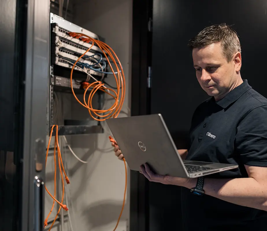 IT technicians work with connecting cables.