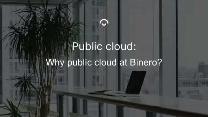 Article image: An office bench with a laptop resting on it, located along a glass wall overlooking rooftops. A large potted palm tree stands next to the bench. Text: Why public cloud at Binero